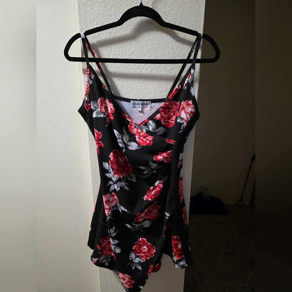 Almost Famous Black Romper with Red Floral Design